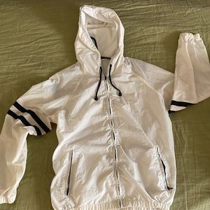 white and navy blue cropped windbreaker